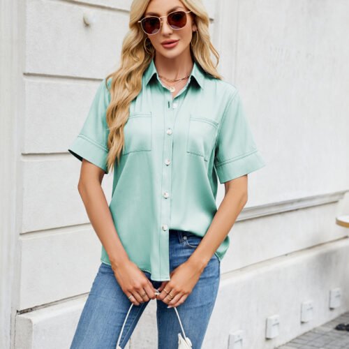 Embrace an effortless vibe with this charming, denim-look short-sleeve shirt. Its relaxed, loose fit and classic single-breasted design make it the perfect versatile piece for a chic, comfortable spring or summer style.