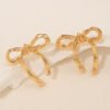 Glossy Gold Bow Earrings – Simple and Stylish Everyday Glam