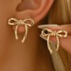 Glossy Gold Bow Earrings – Simple and Stylish Everyday Glam