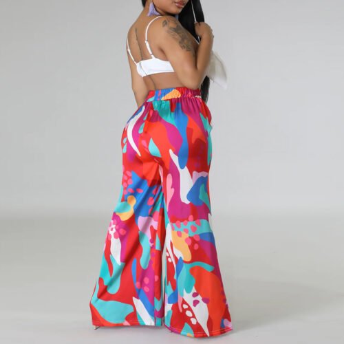 Bold yet comfortable, these printed wide-leg pants feature a lace-up waist and pockets for added flair. Perfect for casual styling with personality and confidence.