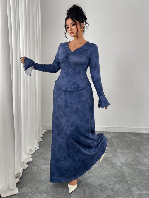 This flattering two-piece set features a V-neck long sleeve top and high-waist A-line skirt for a slimming silhouette. Perfect for spring and autumn, it blends classic elegance with modern feminine appeal.