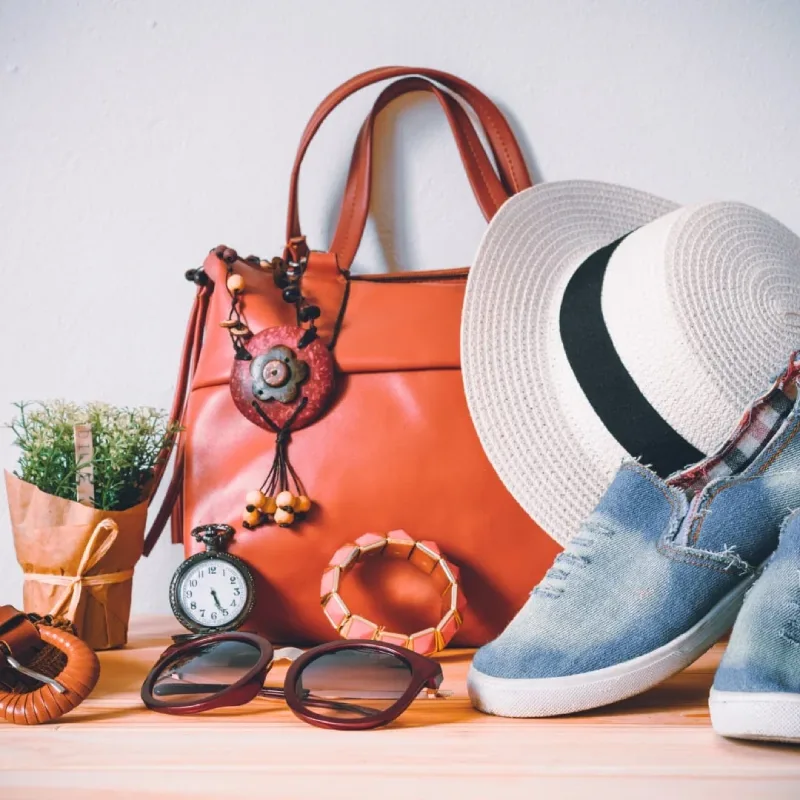 Flatlay of ALiAZON’s best-selling fashion pieces—timeless staples and trend-forward favorites designed to empower confidence.